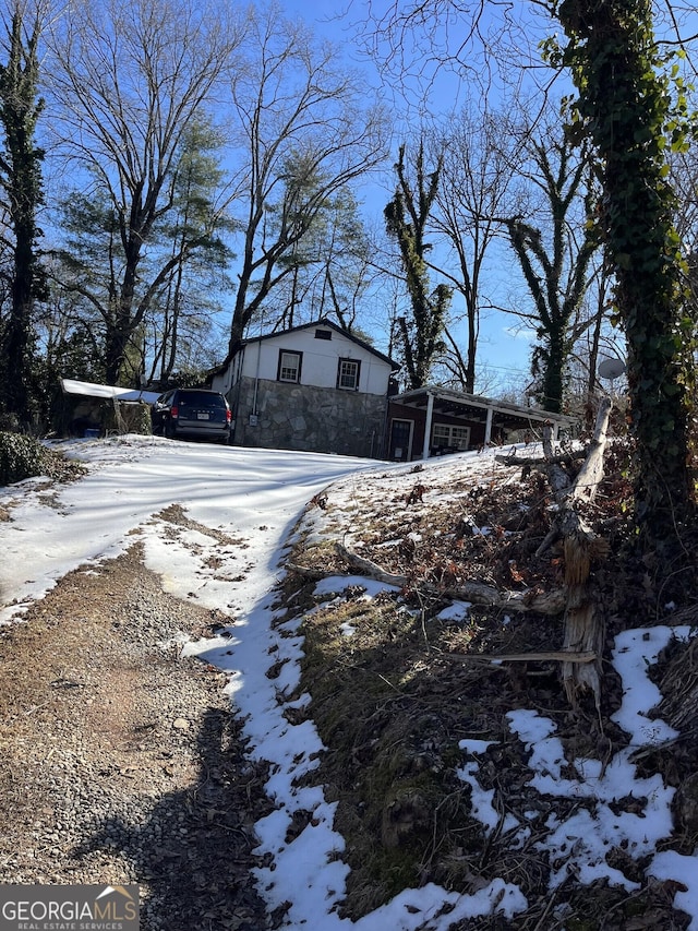 view of yard covered in snow