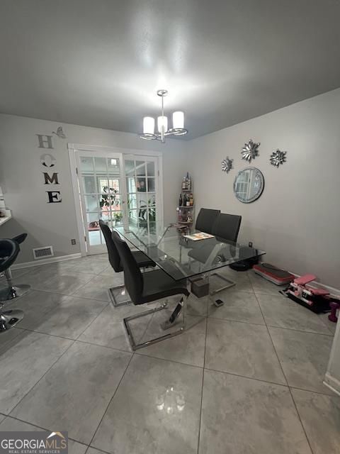 unfurnished dining area with an inviting chandelier