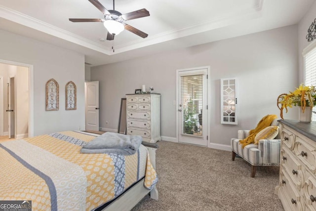 bedroom with a raised ceiling, access to outside, light colored carpet, and ceiling fan