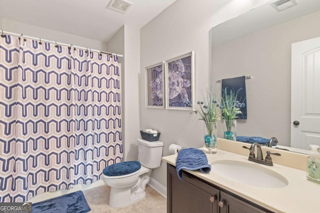 773 Riverwalk Manor Dr, Dallas, GA 30132 - bathroom with toilet, vanity, and curtained shower