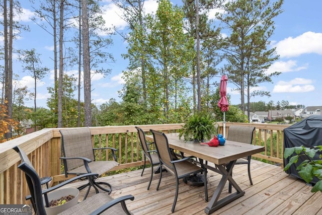 773 Riverwalk Manor Dr, Dallas, GA 30132 - wooden terrace with outdoor dining area
