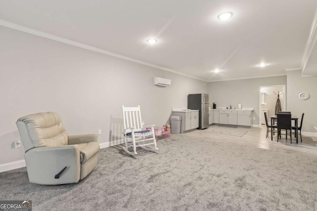 living area with ornamental molding, light carpet, and a wall mounted air conditioner