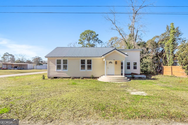 view of front of house with a front yard