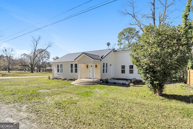 view of front of property with a front yard