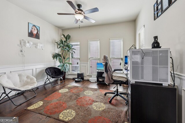 office space with ceiling fan and dark hardwood / wood-style flooring