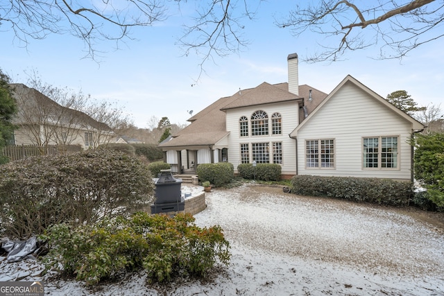 view of snow covered property