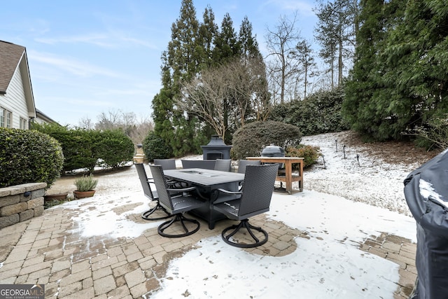 view of snow covered patio