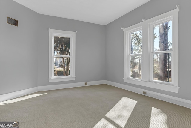 view of carpeted spare room