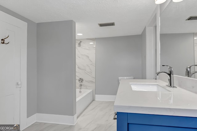 full bathroom with vanity, shower / bathing tub combination, a textured ceiling, and toilet