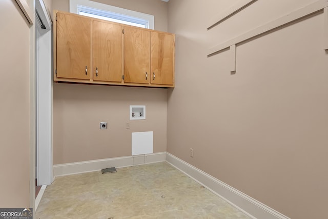 washroom featuring cabinets, hookup for an electric dryer, and hookup for a washing machine