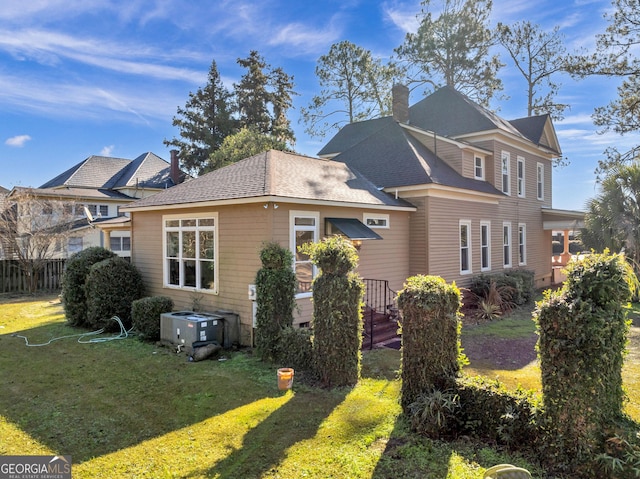 view of property exterior featuring a lawn