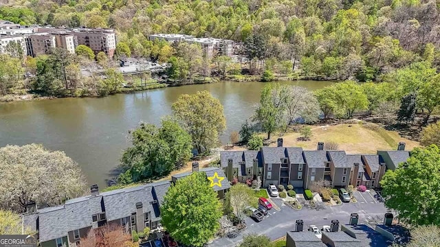 drone / aerial view with a water view