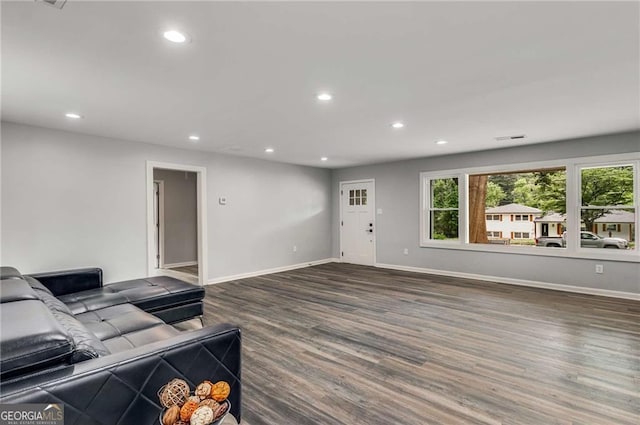 living room featuring dark hardwood / wood-style floors