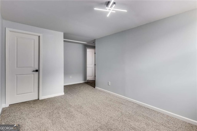 unfurnished bedroom featuring carpet floors