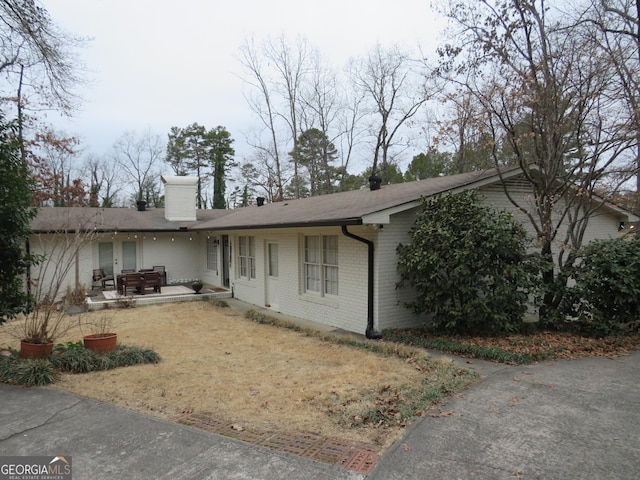 view of front of home featuring a patio