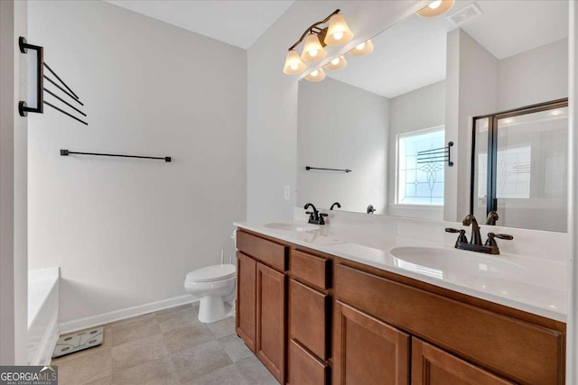 full bathroom with vanity, shower with separate bathtub, and toilet