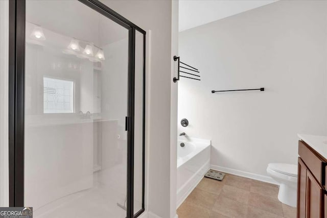 full bathroom featuring vanity, toilet, and separate shower and tub