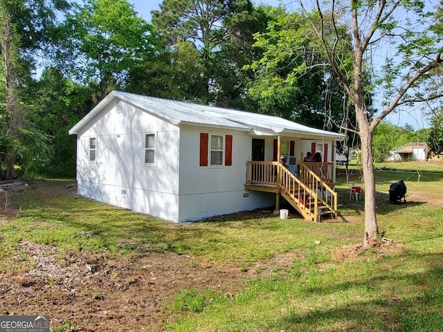 exterior space featuring a yard