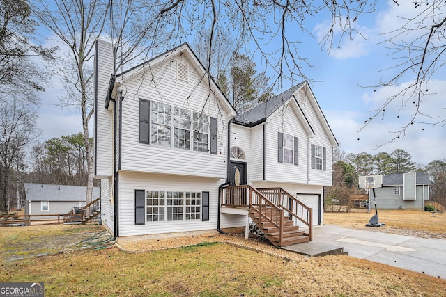 bi-level home featuring a garage