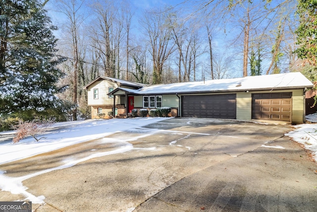 split level home featuring a garage