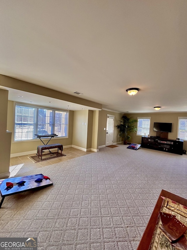 interior space featuring light colored carpet