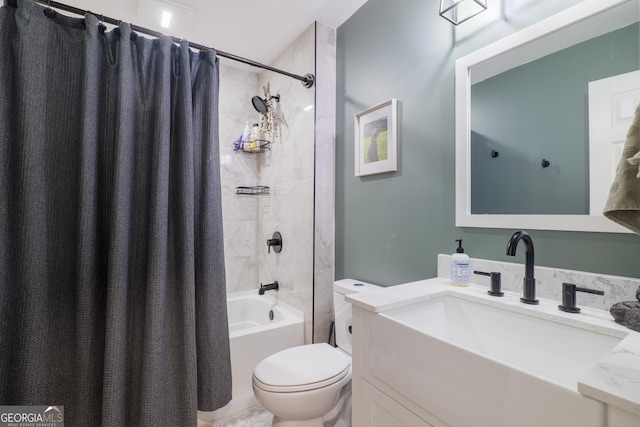 full bathroom featuring shower / bath combination with curtain, vanity, and toilet