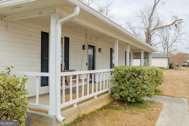 entrance to property with a porch