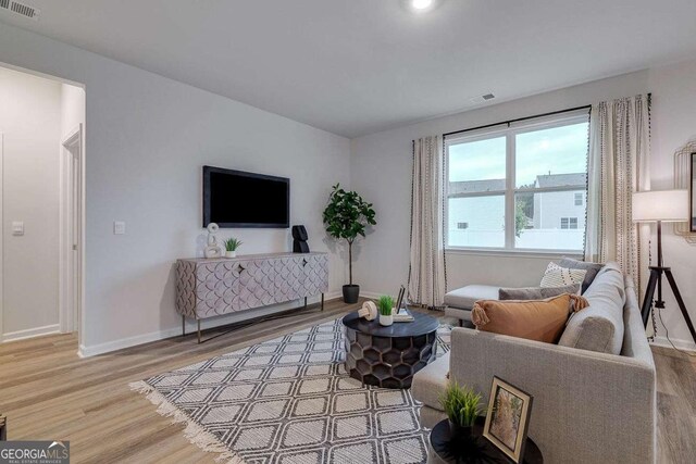 living room with hardwood / wood-style floors