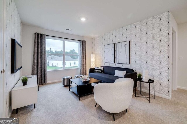 living room featuring light colored carpet