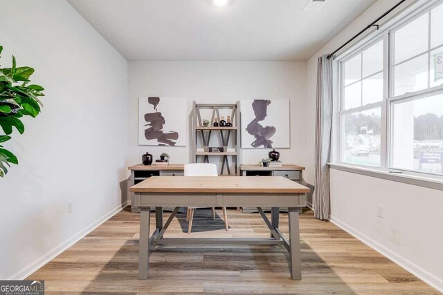 home office featuring hardwood / wood-style floors