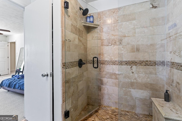 bathroom featuring ceiling fan and walk in shower