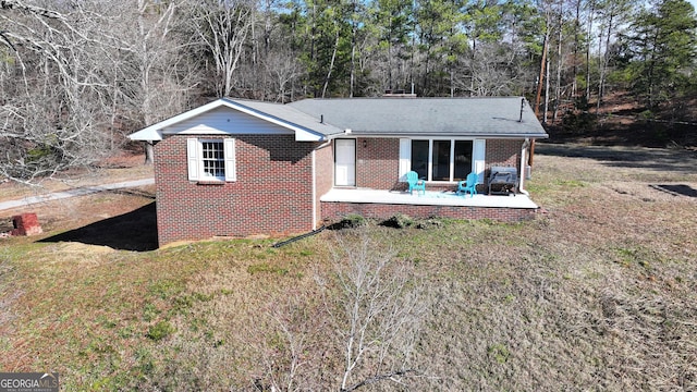 1202 Franklin Rd SW, Plainville, GA 30733 - single story home with brick siding, a front lawn, and a shingled roof
