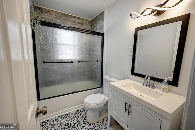 1202 Franklin Rd SW, Plainville, GA 30733 - full bathroom with toilet, vanity, bath / shower combo with glass door, and tile patterned floors