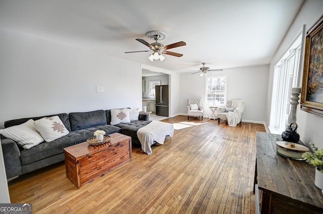 1202 Franklin Rd SW, Plainville, GA 30733 - living room featuring ceiling fan and wood-type flooring