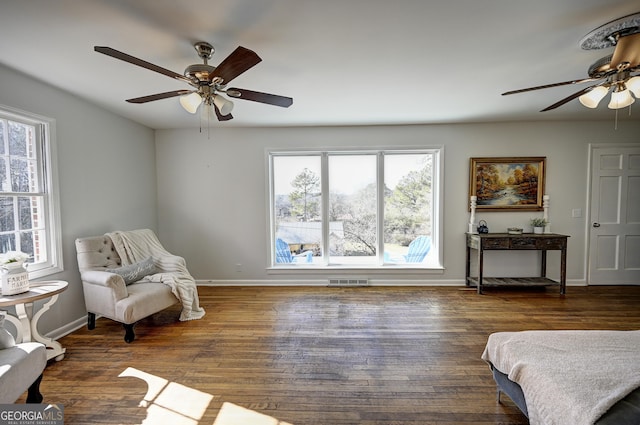 1202 Franklin Rd SW, Plainville, GA 30733 - sitting room with a ceiling fan, plenty of natural light, baseboards, and wood finished floors