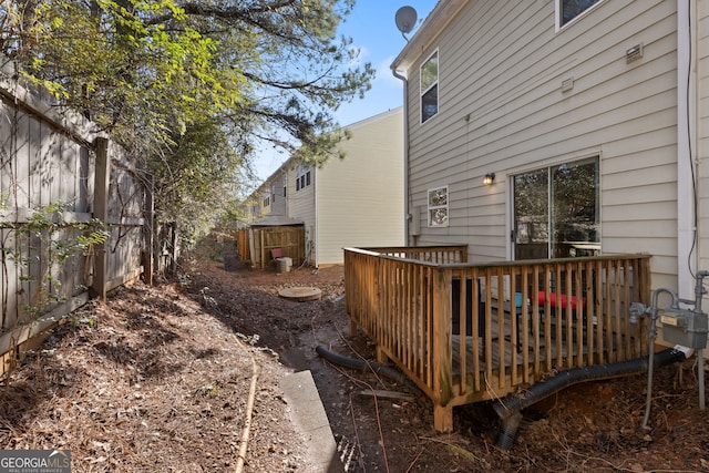 view of yard with a wooden deck