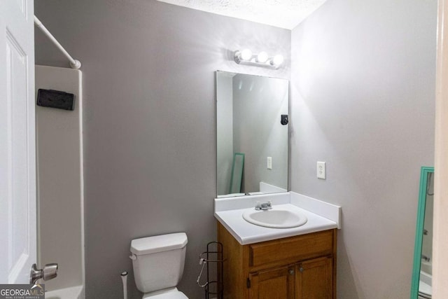 full bathroom with toilet, shower / washtub combination, and vanity