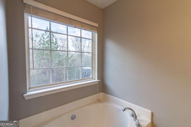 bathroom with a bath