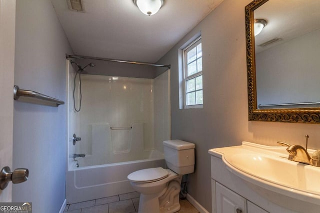 bathroom featuring visible vents, vanity, tile patterned flooring, and toilet