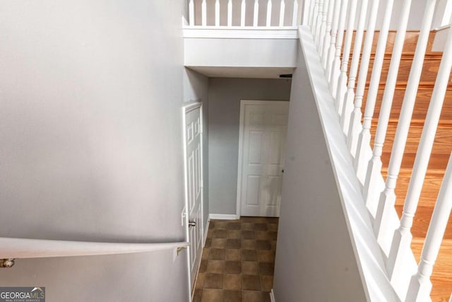 staircase with baseboards