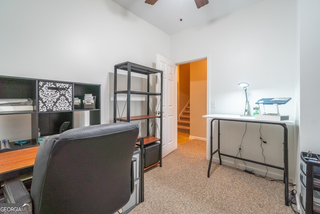 carpeted office with ceiling fan