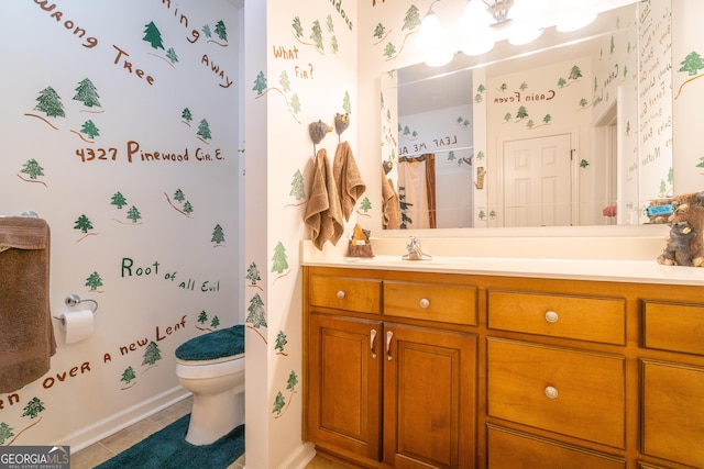 bathroom featuring vanity, toilet, curtained shower, and tile patterned flooring