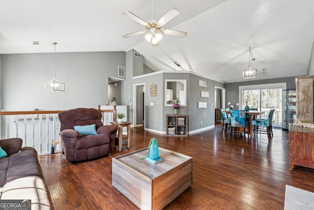 living room with high vaulted ceiling, ceiling fan with notable chandelier, and dark hardwood / wood-style flooring