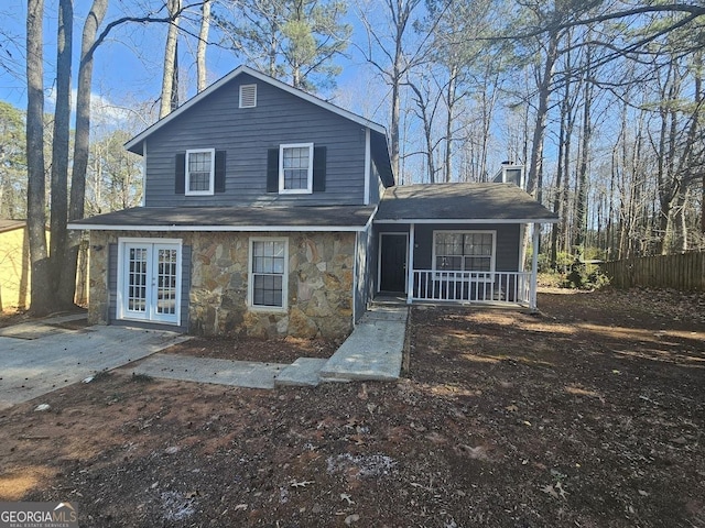 view of front of property featuring french doors and a porch