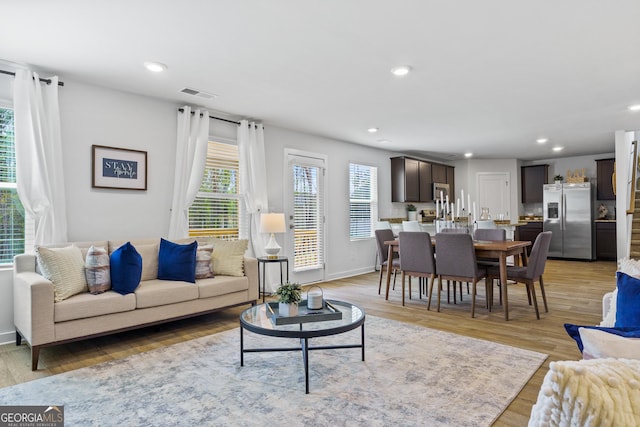 living room with light wood-type flooring