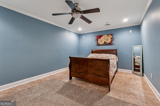 tiled bedroom with ceiling fan and ornamental molding