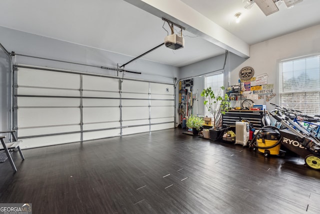 garage featuring a garage door opener