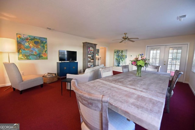 dining area featuring french doors, ceiling fan, and carpet