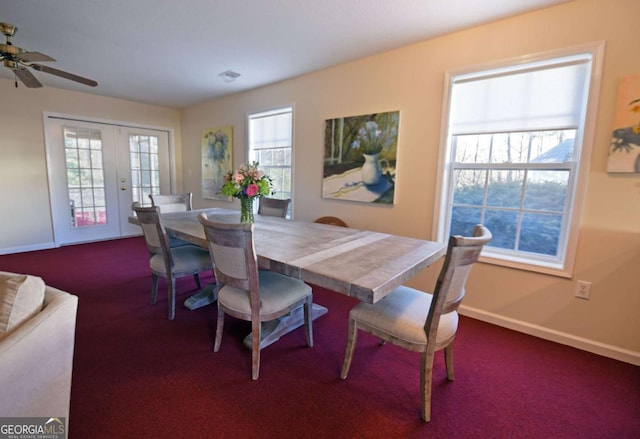 dining area with french doors and dark colored carpet