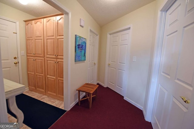 interior space featuring a textured ceiling